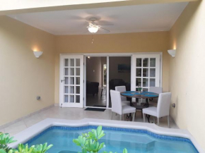 NEW 2-Bedroom with pool opposite West Coast beach